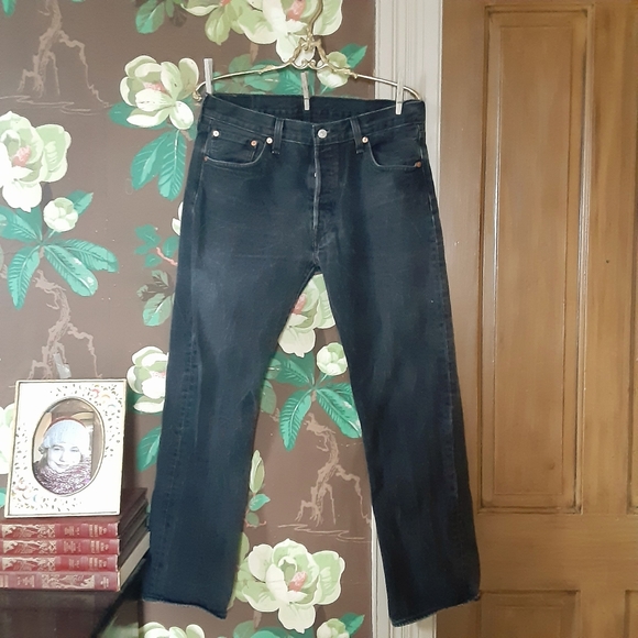 faded black denim jeans